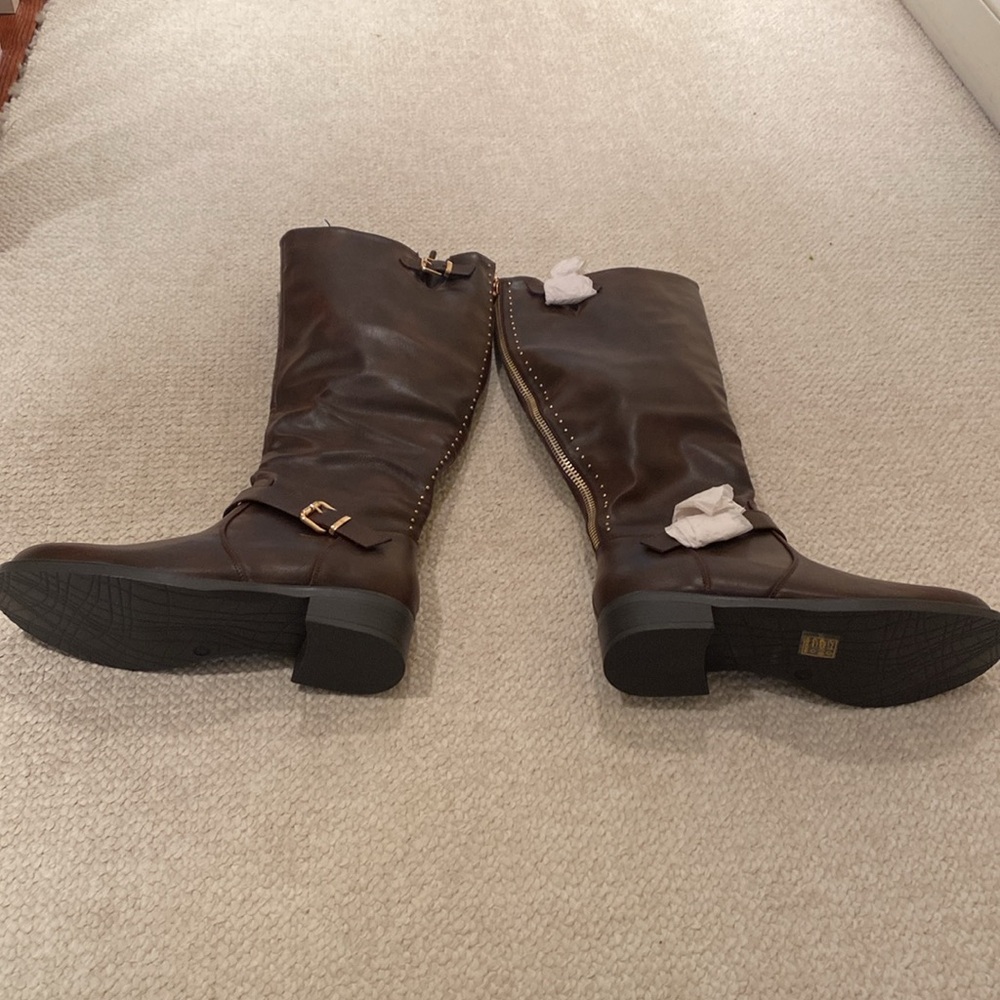 Dark brown Knee-High Boots with gold accents.